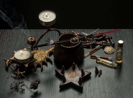pagan objects with incense sticks