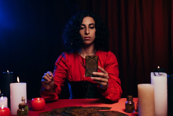 ukranian woman with candles and tarot cards